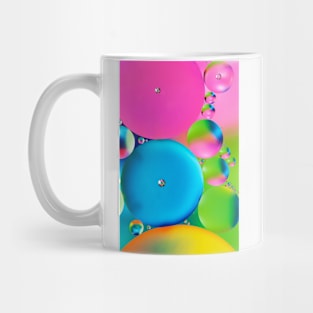 Colorful close up of oil drops in water Mug